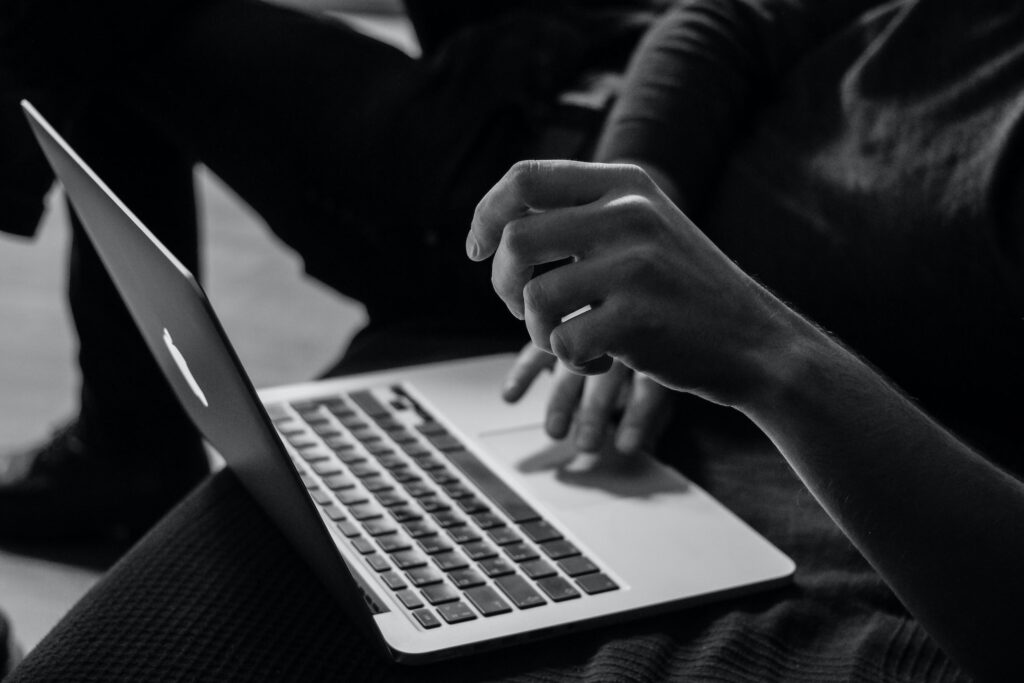 A student with a laptop learning how to become an online content writer.